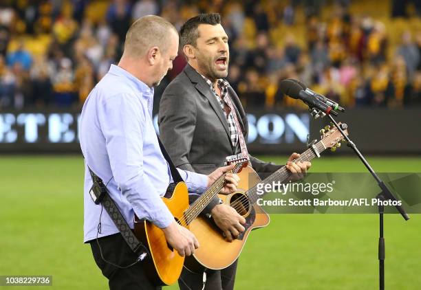 Russell Robertson sings the national anthem during the VFL Grand Final match between Casey and Box Hill at Etihad Stadium on September 23, 2018 in...