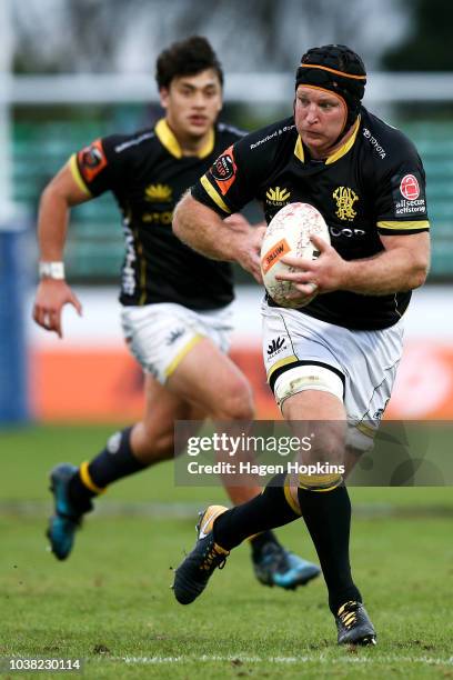 Thomas Waldrom of Wellington makes a charge with Thomas Umaga-Jensen in support during the round six Mitre 10 Cup match between Manawatu and...