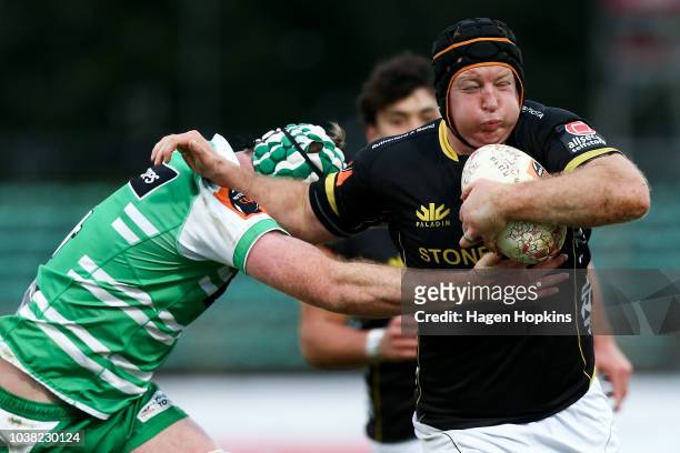 Thomas Waldrom of Wellington is tackled during the round six Mitre 10 Cup match between Manawatu and Wellington at Central Energy Trust Arena on...