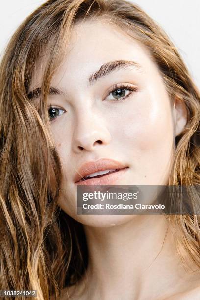 Model Grace Elizabeth is seen backstage ahead of the Philosophy Di Lorenzo Serafini show during Milan Fashion Week Spring/Summer 2019 on September...