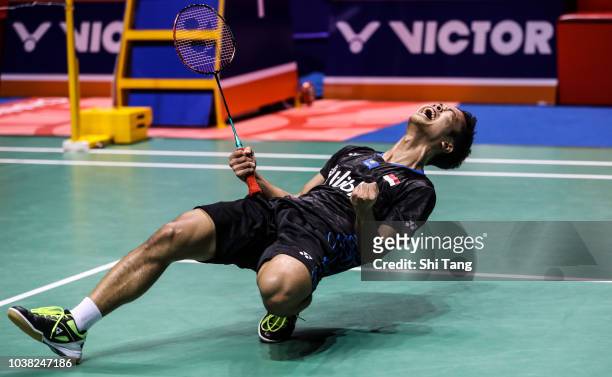 Anthony Sinisuka Ginting of Indonesia celebrates the victory after the Men's Single final match against Kento Momota of Japan on day six of the China...