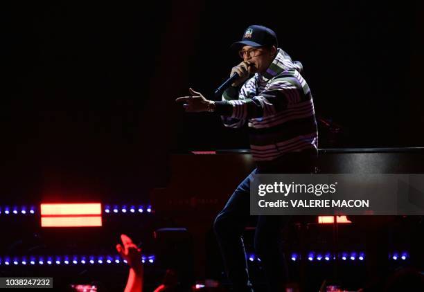 Rapper Logic performs on stage during the iHeartRadio Music Festival at the T-Mobile arena in Las Vegas, Nevada on September 22, 2018.