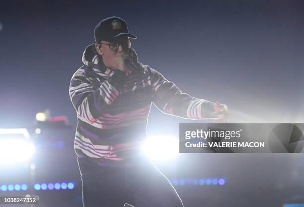Rapper Logic performs on stage during the iHeartRadio Music Festival at the T-Mobile arena in Las Vegas, Nevada on September 22, 2018.