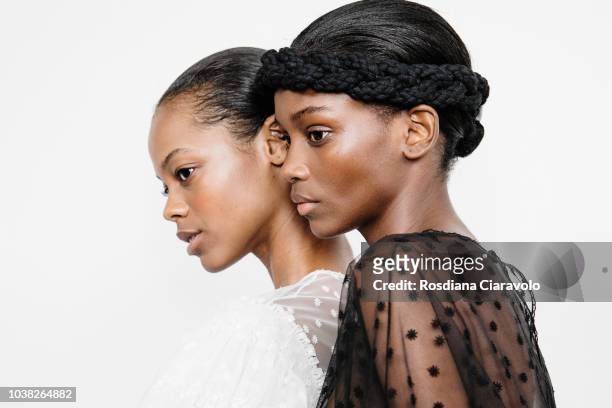 Models Aaliyah Hydes and Elibeidy Dani are seen backstage ahead of the Philosophy Di Lorenzo Serafini show during Milan Fashion Week Spring/Summer...