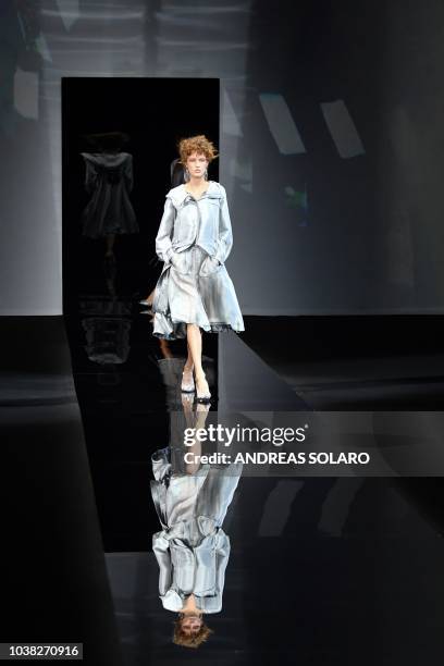 Model presents a creation during the Armani fashion show, as part of the Women's Spring/Summer 2019 fashion week in Milan, on September 23, 2018.