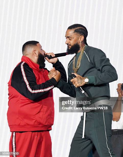 Busta Rhymes and Nipsey Hussle perform onstage during the 'On The Run II' Tour at Rose Bowl on September 22, 2018 in Pasadena, California.