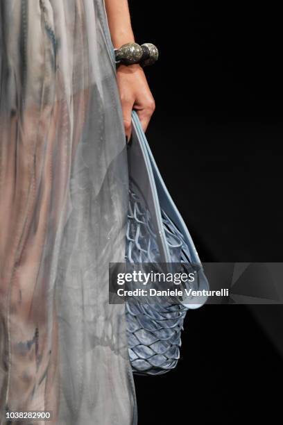 Model, bag detail, walks the runway at the Giorgio Armani show during Milan Fashion Week Spring/Summer 2019 on September 23, 2018 in Milan, Italy.