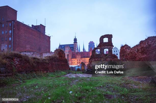 wwii ruins at granary island at dusk. - destroyed city stock pictures, royalty-free photos & images