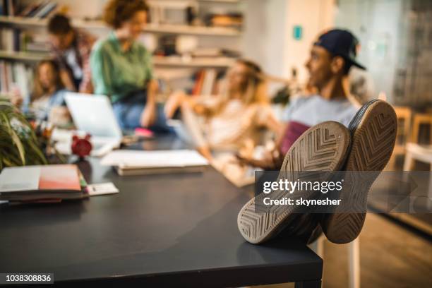 close up of sole of man's shoe resting on the table. - smart shoes stock pictures, royalty-free photos & images