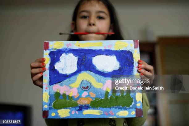 girl holiday painting. - kids art stock pictures, royalty-free photos & images