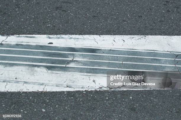 tire tracks in zebra crossing - skid marks accident stock pictures, royalty-free photos & images