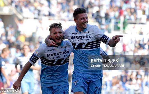Lazio's Serbian midfielder Sergej Milinkovic-Savic celebrates after scoring a goal during the Italian Serie A football match between SS Lazio and...