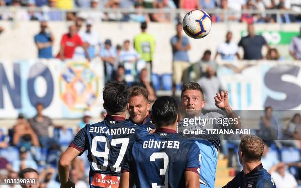 Lazio's Serbian midfielder Sergej Milinkovic-Savic eyes the ball during the Italian Serie A football match between SS Lazio and Genoa CFC at the...