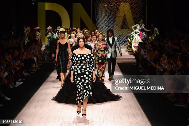 Italian model and actress Monica Bellucci and models present creations during the Dolce & Gabbana fashion show, as part of the Women's Spring/Summer...