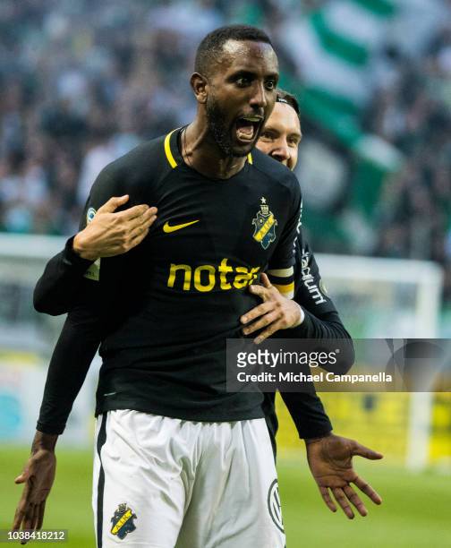 Henok Goitom of AIK celebrates scoring the 1-0 goal with teammate Kristoffer Olsson during an Allsvenskan match between AIK and Hammarby IF at...