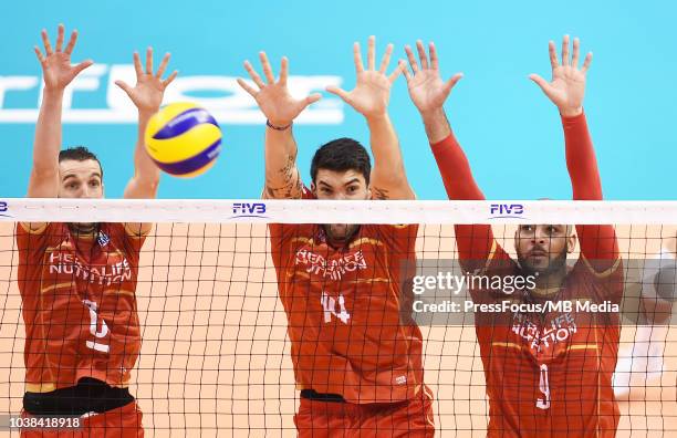 Benjamin Toniutti, Nicolas Le Goff and Earvin Ngapeth of France in action during FIVB World Championships match between France and Argentina on...