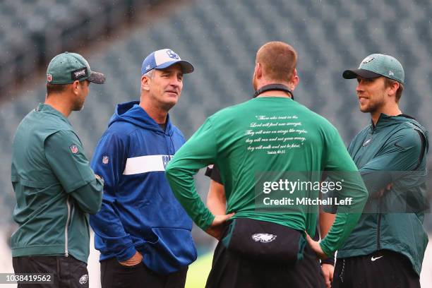 Offensive Coordinator Mike Groh of the Philadelphia Eagles, head coach Frank Reich of the Indianapolis Colts, quarterback Carson Wentz and...