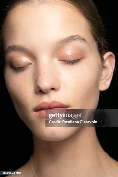 Model, make up detail, is seen backstage ahead of the Fila show during Milan Fashion Week Spring/Summer 2019 on September 23, 2018 in Milan, Italy.