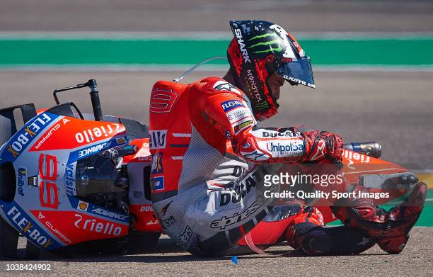 Jorge Lorenzo of Spain and Ducati Team lies at the track after a crash during MotoGP race of the MotoGP Grand Prix of Aragon at Motorland Aragon...