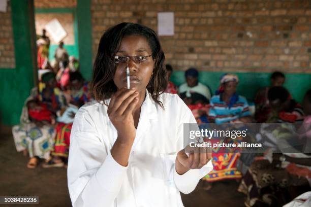 Babies are vaccinated against tuberculosis and polio are pictured in a health station in Rukogo near Kayanza in the north of Burundi, 23 September...