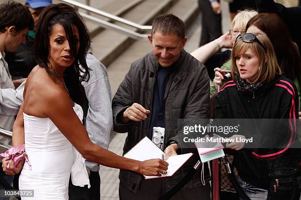Television presenter Jenny Powell talks to fans as she arrives at the National Lottery Awards 2010 held at the Camden Roundhouse on September 4, 2010...