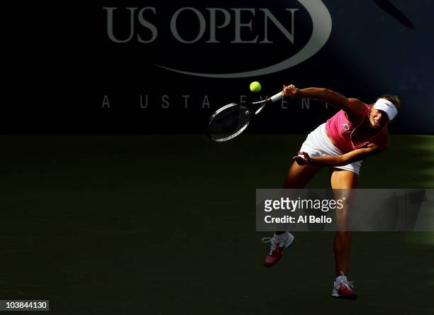 Yanina Wickmayer of Belguim serves against Patty Schnyder of Switzerland during her women's singles match on day six of the 2010 U.S. Open at the...