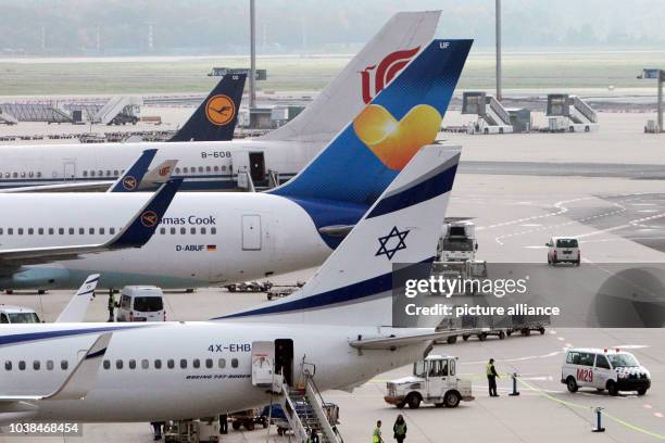 Beside a Lufthana aircraft are those from other airline companies at the airport in Frankfurt am Main, Germany, 20 October 2014. Members of the...