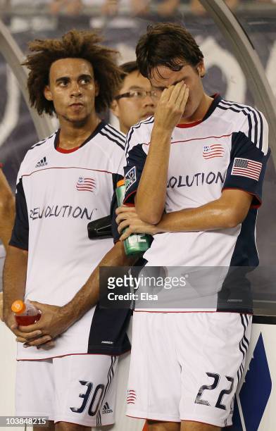 Roberto Linck, Kevin Alston of the New England Revolution react to the loss of the SuperLiga 2010 championship game on September 1, 2010 at Gillette...