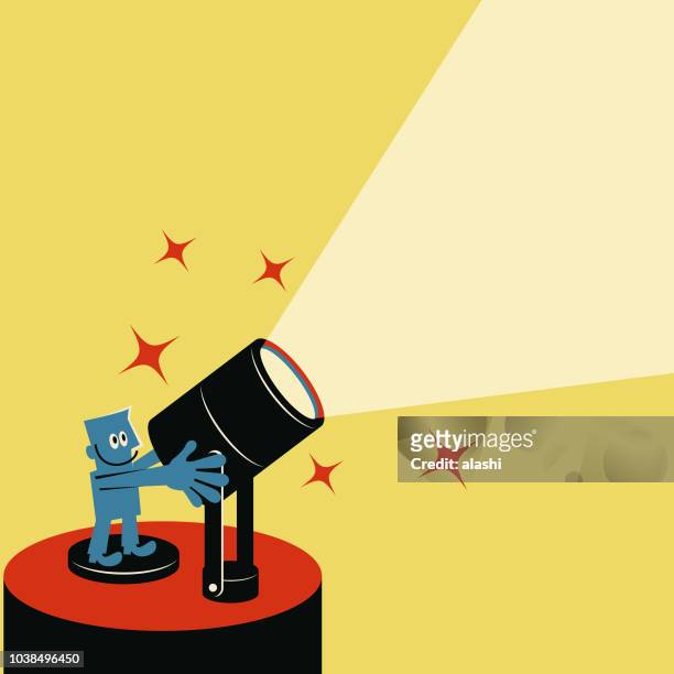lächelnd blauen mann mit spotlight - flutlichter stock-grafiken, -clipart, -cartoons und -symbole