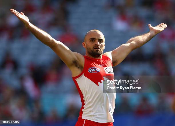 Rhyce Shaw of the Swans celebrates a goal during the AFL First Elimination Final match between the Sydney Swans and the Carlton Blues at ANZ Stadium...