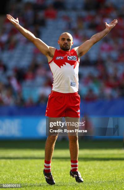 Rhyce Shaw of the Swans celebrates a goal during the AFL First Elimination Final match between the Sydney Swans and the Carlton Blues at ANZ Stadium...