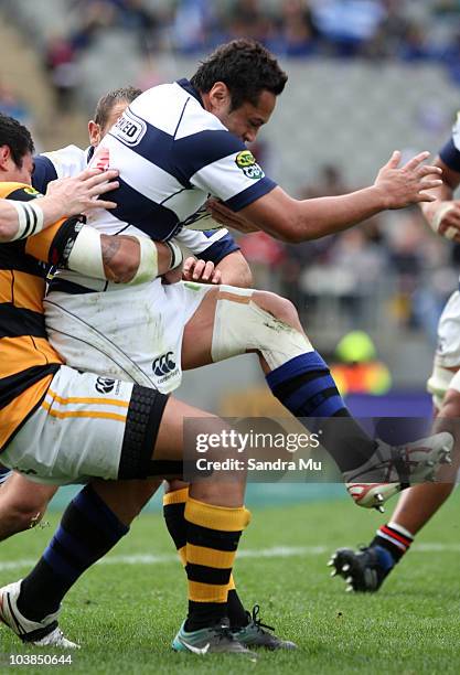 George Pisi of Taranaki tackles Ben Atiga of Auckland during the round six ITM Cup match between Auckland and Taranaki at Eden Park on September 5,...