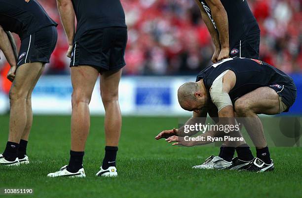 Chris Judd of Blues looks dejected after the AFL First Elimination Final match between the Sydney Swans and the Carlton Blues at ANZ Stadium on...