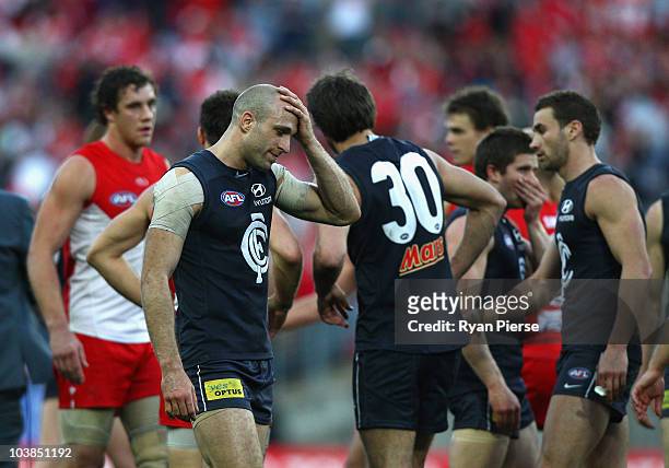 Chris Judd of Blues looks dejected after the AFL First Elimination Final match between the Sydney Swans and the Carlton Blues at ANZ Stadium on...
