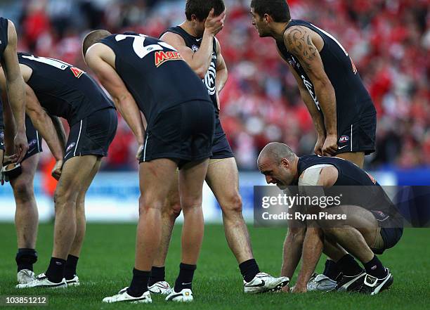 Chris Judd of Blues looks dejected after the AFL First Elimination Final match between the Sydney Swans and the Carlton Blues at ANZ Stadium on...