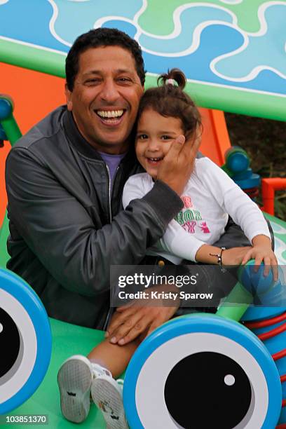 Smain and his daughter attend the Toy Story Playland opening caremonies at Disneyland Paris on September 4, 2010 in Paris, France.