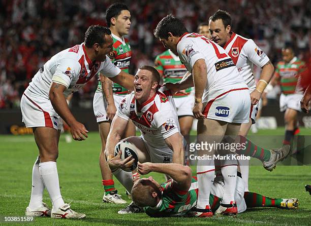 Ben Creagh of the Dragons celebrates scoring a try during the round 26 NRL match between the St George Illawarra Dragons and the South Sydney...