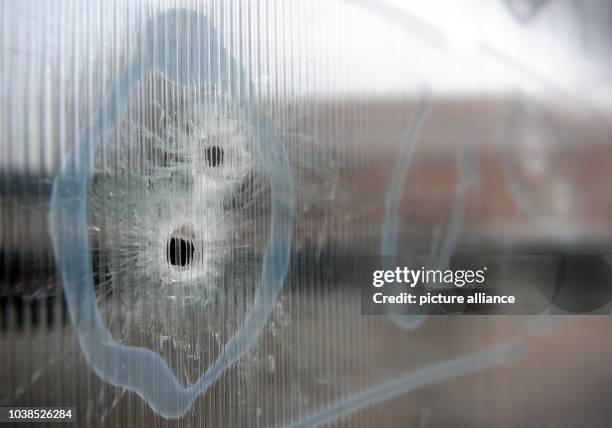 Bulletholes after a terrorist attack at the Krudttonden cafe in Copenhagen, Denmark, 17 February 2015. Danish police said that a man they shot dead...