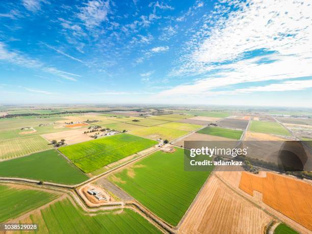 aerial view of farmland in california - tracy california stock pictures, royalty-free photos & images