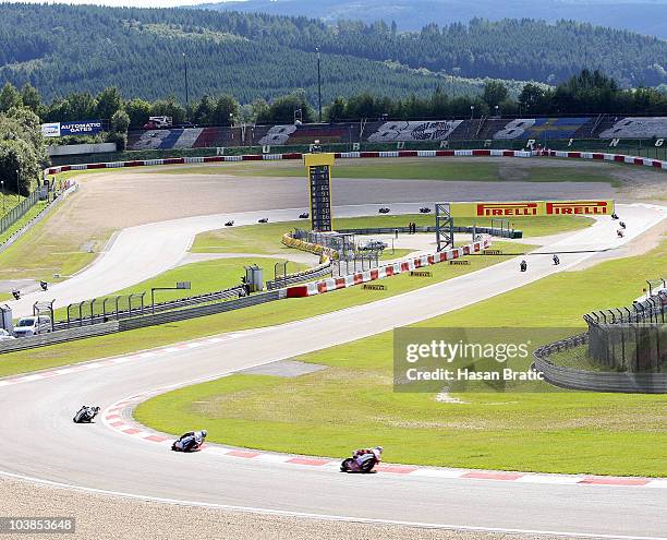 Noriyuki Haga of Japan and Ducati Xerox Team with Carlos Checa of Spain and Althea Racing and Jonathan Rea of England and HANNspree Ten Kate Honda in...