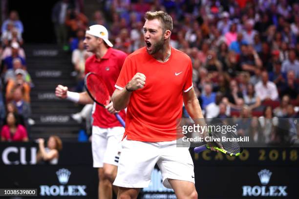 Team World Jack Sock of the United States and Team World John Isner of the United States celebrate a point against Team Europe Alexander Zverev of...