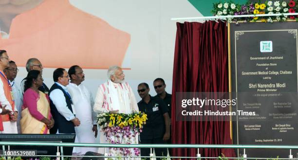 Prime Minister Narendra Modi along with state governor Draupadi Murmu, Jharkhand chief minister Raghubar Das and Health Minister Jagat Prakash Nadda...