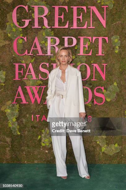 Amber Valletta, wearing Agnona, attends The Green Carpet Fashion Awards Italia 2018 at Teatro Alla Scala on September 23, 2018 in Milan, Italy.