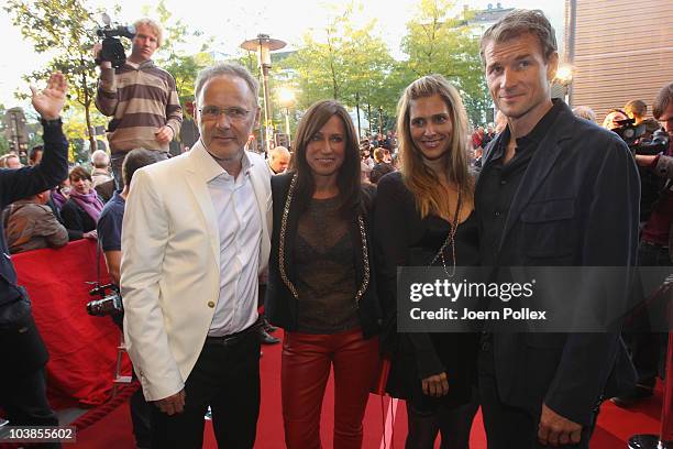 Presenter Reinhold Beckmann and his wife Kerstin and Jens Lehmann and his wife Conny attend the Day of Legends gala Night of Legends at the Schmitz...