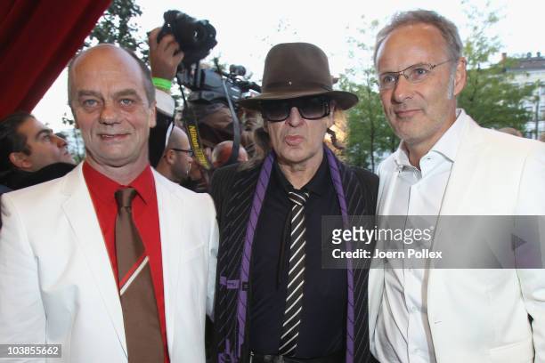 Corny Littmann , Udo Lindenberg and presenter Reinhold Beckmann attend the Day of Legends gala Night of Legends at the Schmitz Tivoli theatre on...