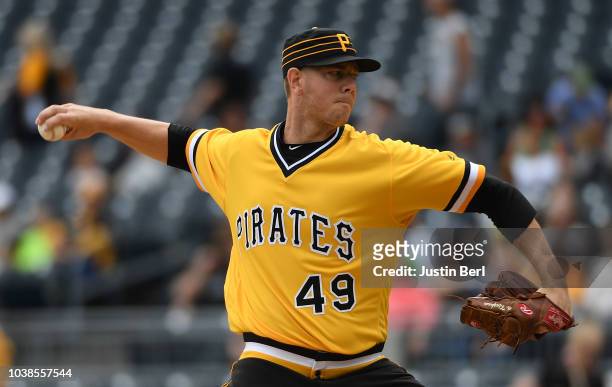 Nick Kingham of the Pittsburgh Pirates delivers a pitch in the first inning during the game against the Milwaukee Brewers at PNC Park on September...