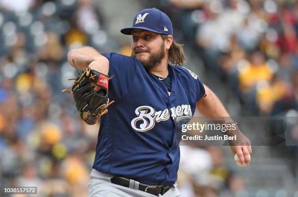 Wade Miley of the Milwaukee Brewers delivers a pitch in the first inning during the game against the Pittsburgh Pirates at PNC Park on September 23,...