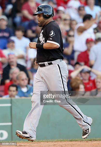 Ramon Castro of the Chicago White Sox scored the game winning run on a bases loaded walk in the ninth inning against the Boston Red Sox September 5,...