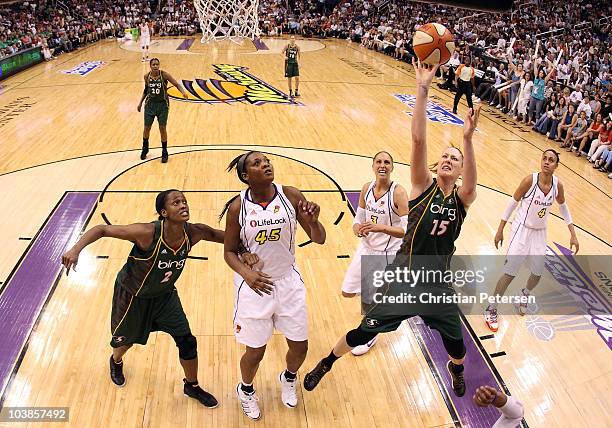 Lauren Jackson #!5 of the Seattle Storm puts up a shot over Kara Braxton of the Phoenix Mercury in Game Two of the Western Conference Finals during...
