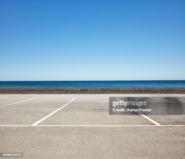 empty beach front parking lot - concrete footpath stock pictures, royalty-free photos & images